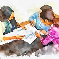 Two female lawyers assisting their client review immigration forms and documents